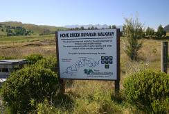 Signage and fencing at Home Creek reserve.
